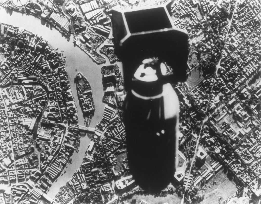 Aerial photo showing the close up of a bomb in the air over the Manila city-scape