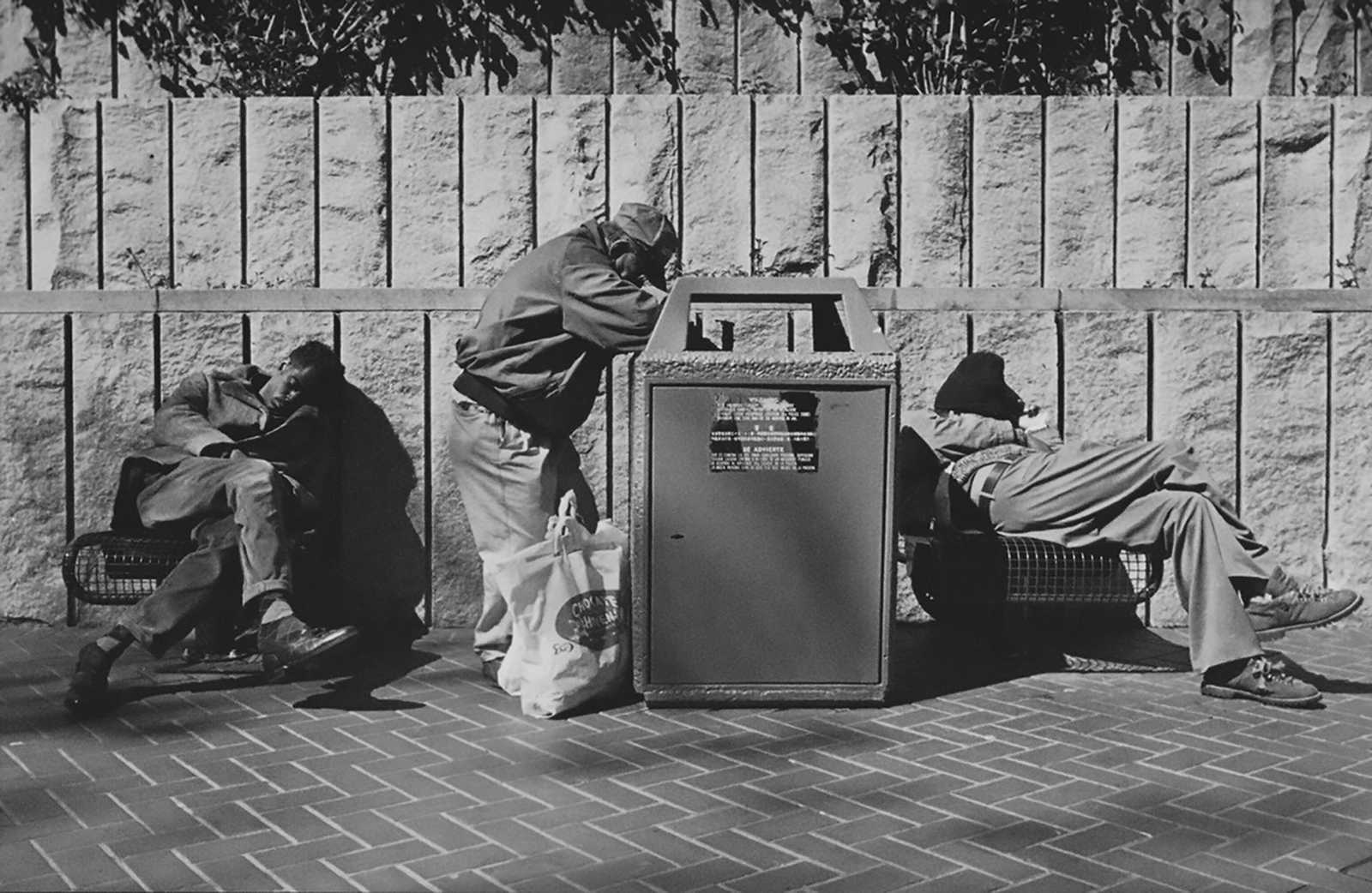 Veterans by a garbage can 