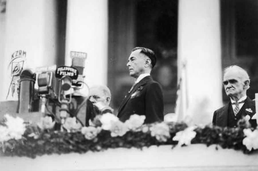 Black and white photo of Manuel Quezon giving a speech